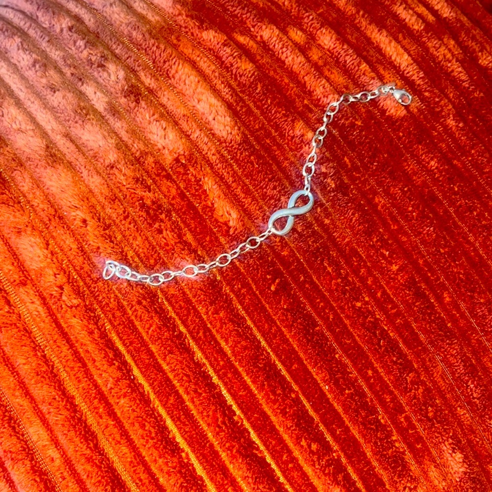 TIFFANY AND CO INFINITY BRACELET